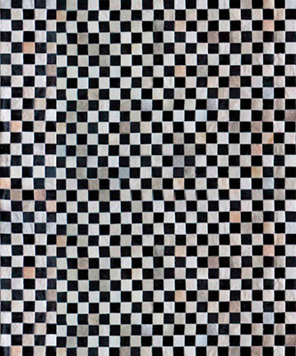 Checkerboard patchwork cowhide rug