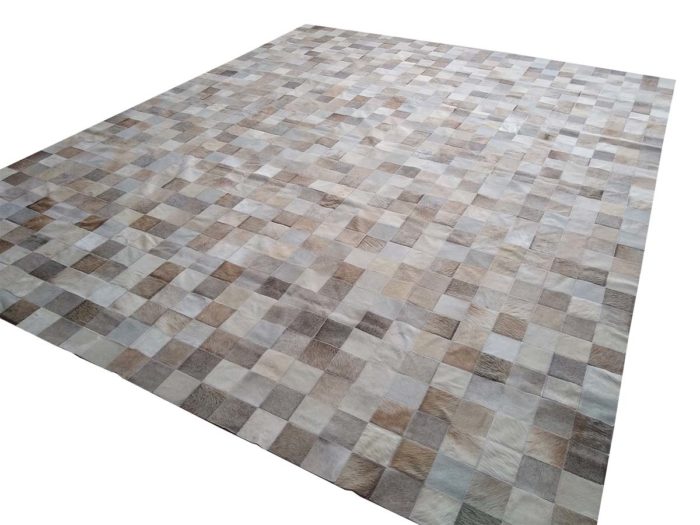 Full view of our Taupe Squares Patch Cowhide Rug