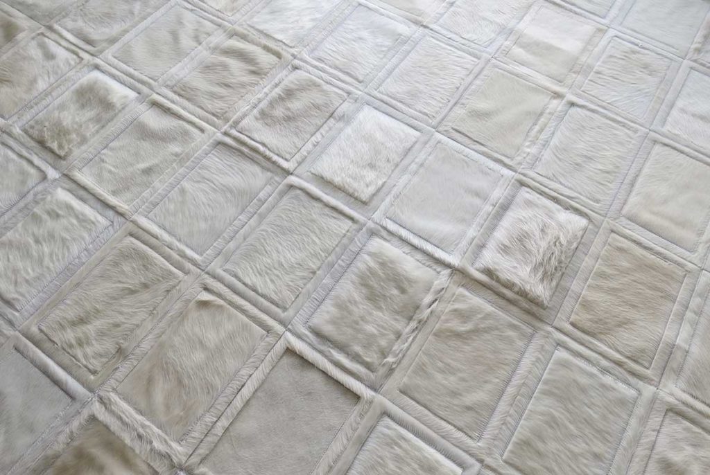 mona white patchwork cowhide rug
