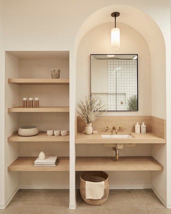 arched washroom bathroom in soft beige and white 