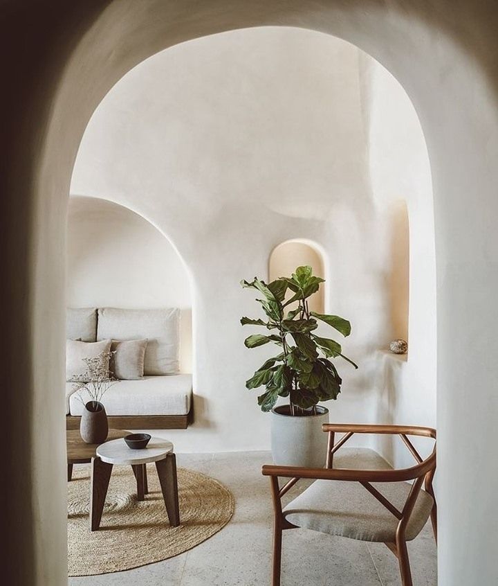 greek style arches for a modern living room with contemporary furniture and plant
