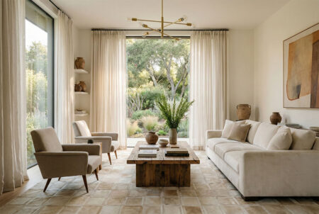 312 Beige Mona Cowhide Rug in Modern Living Room Beige Mona patchwork cowhide rug in a modern living room with neutral decor