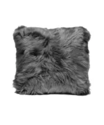 A dark grey, long-haired fluffy throw pillow on white