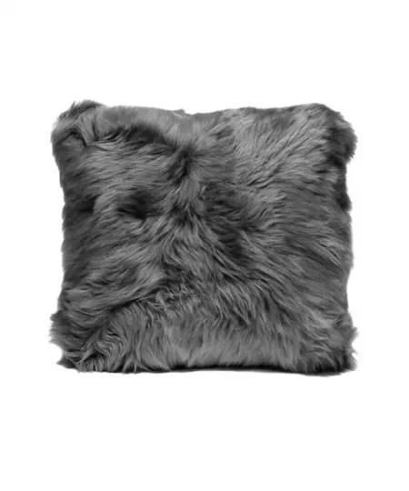 A dark grey, long-haired fluffy throw pillow on white